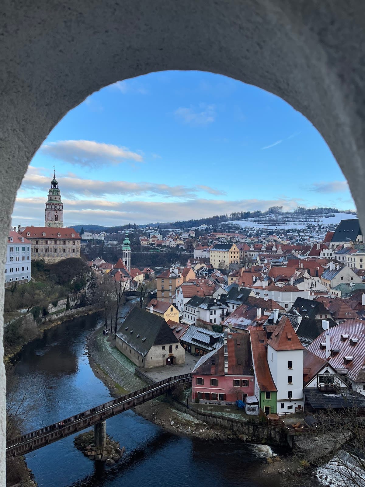 Iconic view of Cesky Krumlov Castle and the Vltava River bend.