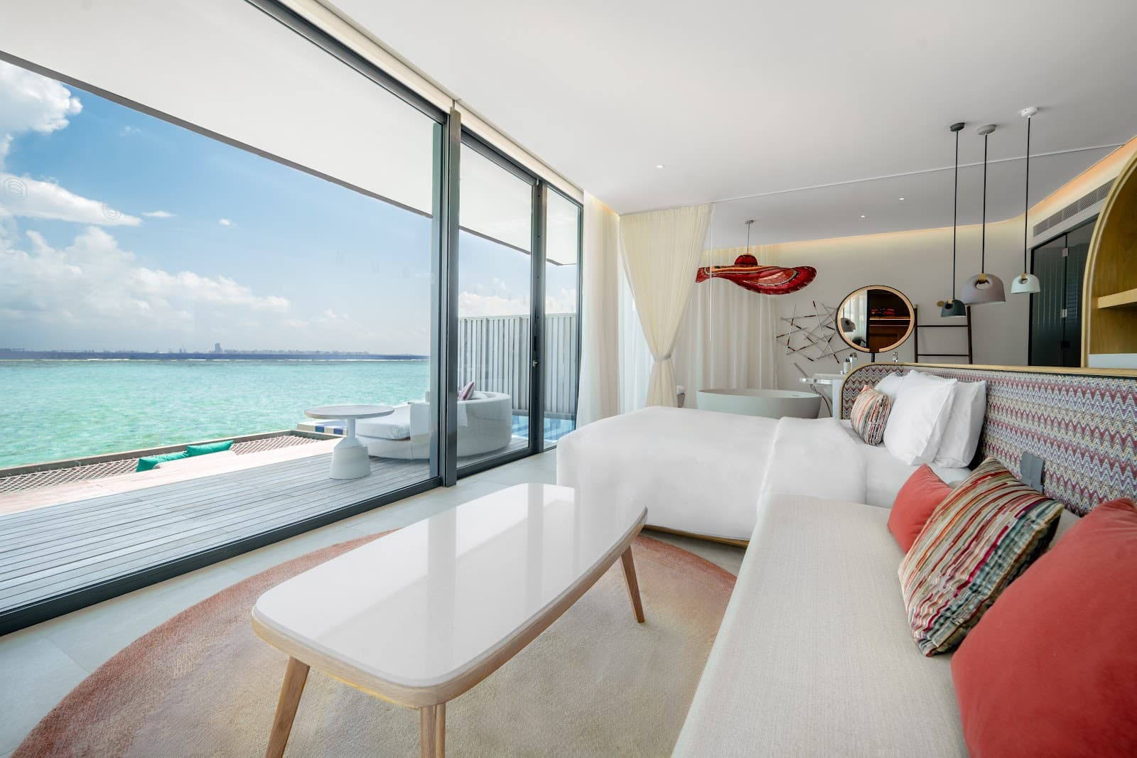 Modern luxury meets ocean views in this chic suite.