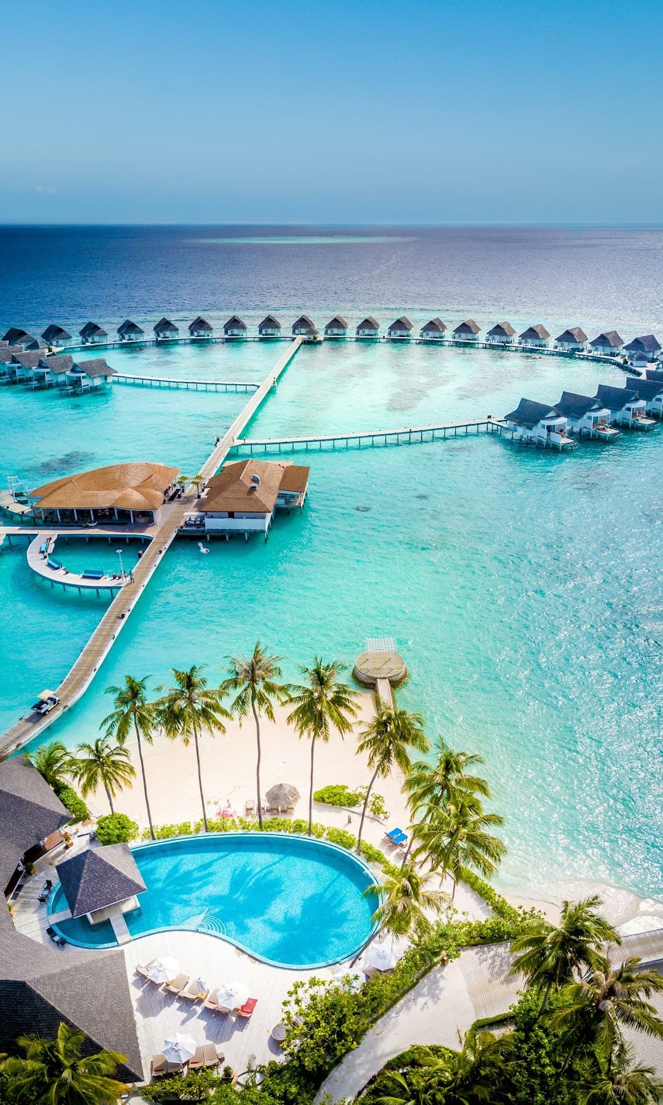Aerial view of the iconic overwater villa layout.