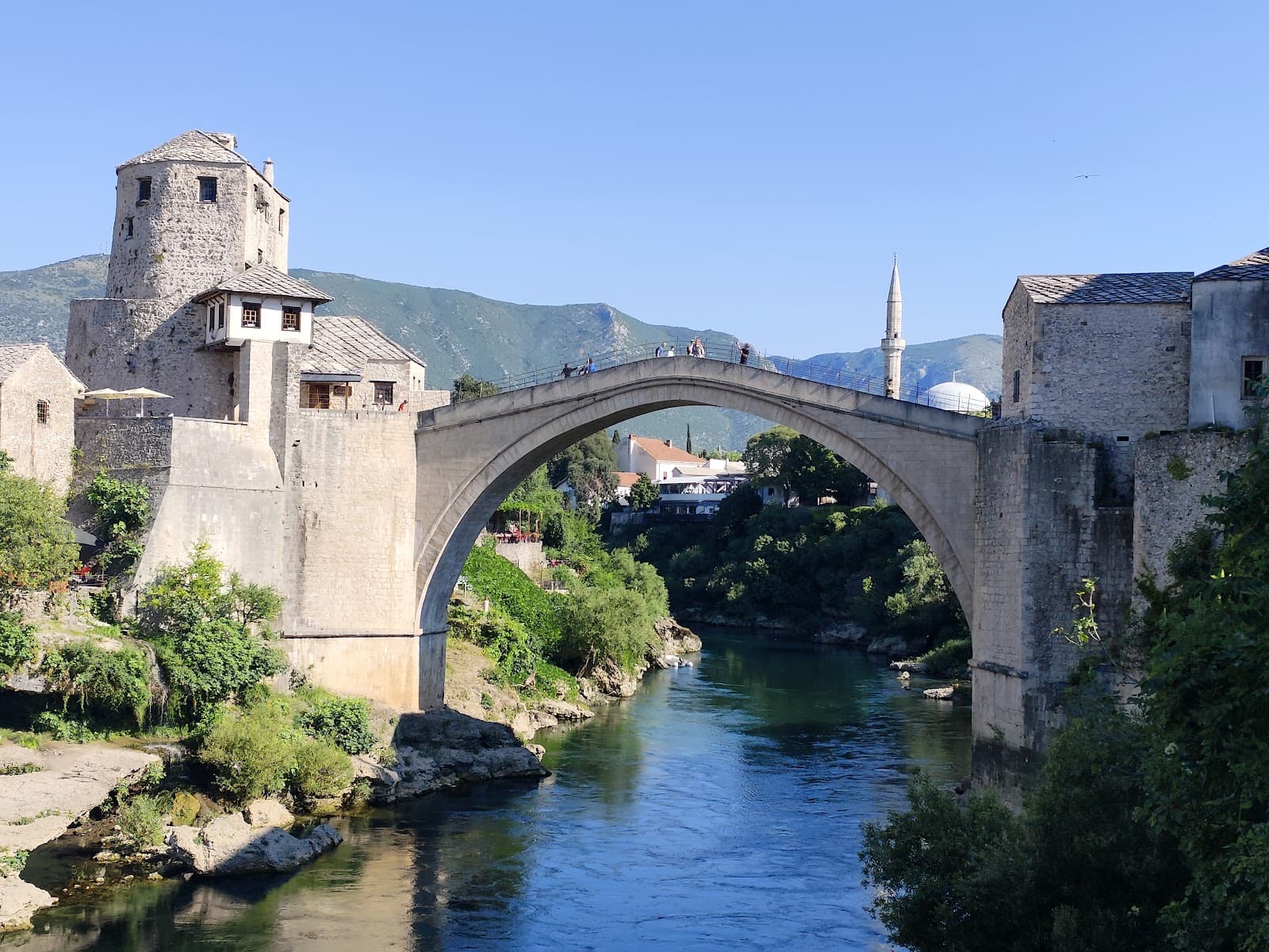 Iconic side view of the historic Stari Most bridge in Mostar.
