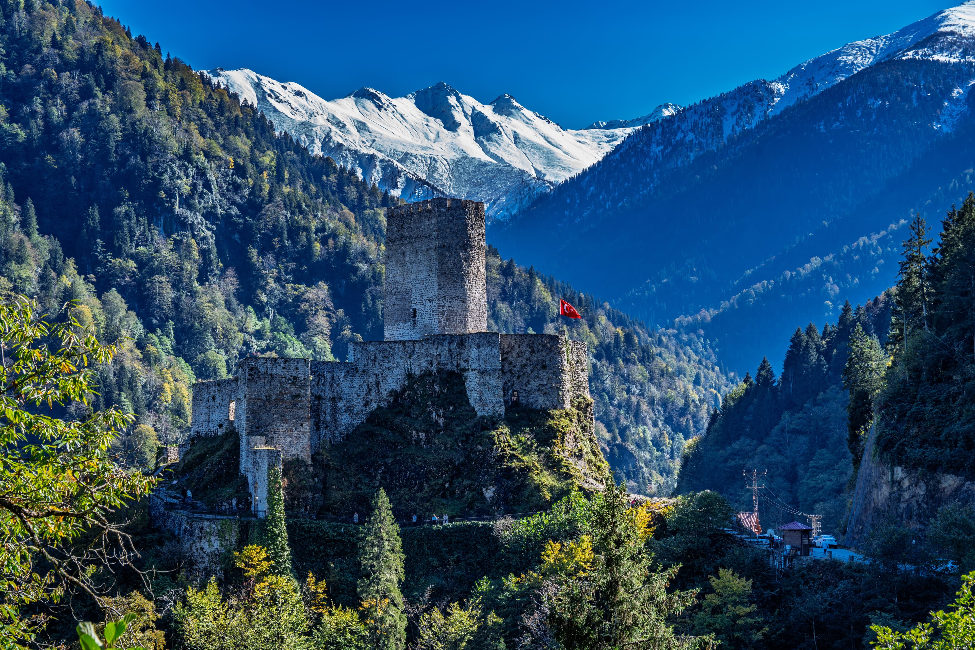 Medieval Zilkale Castle overlooking the Firtina Valley with snowy mountain peaks.