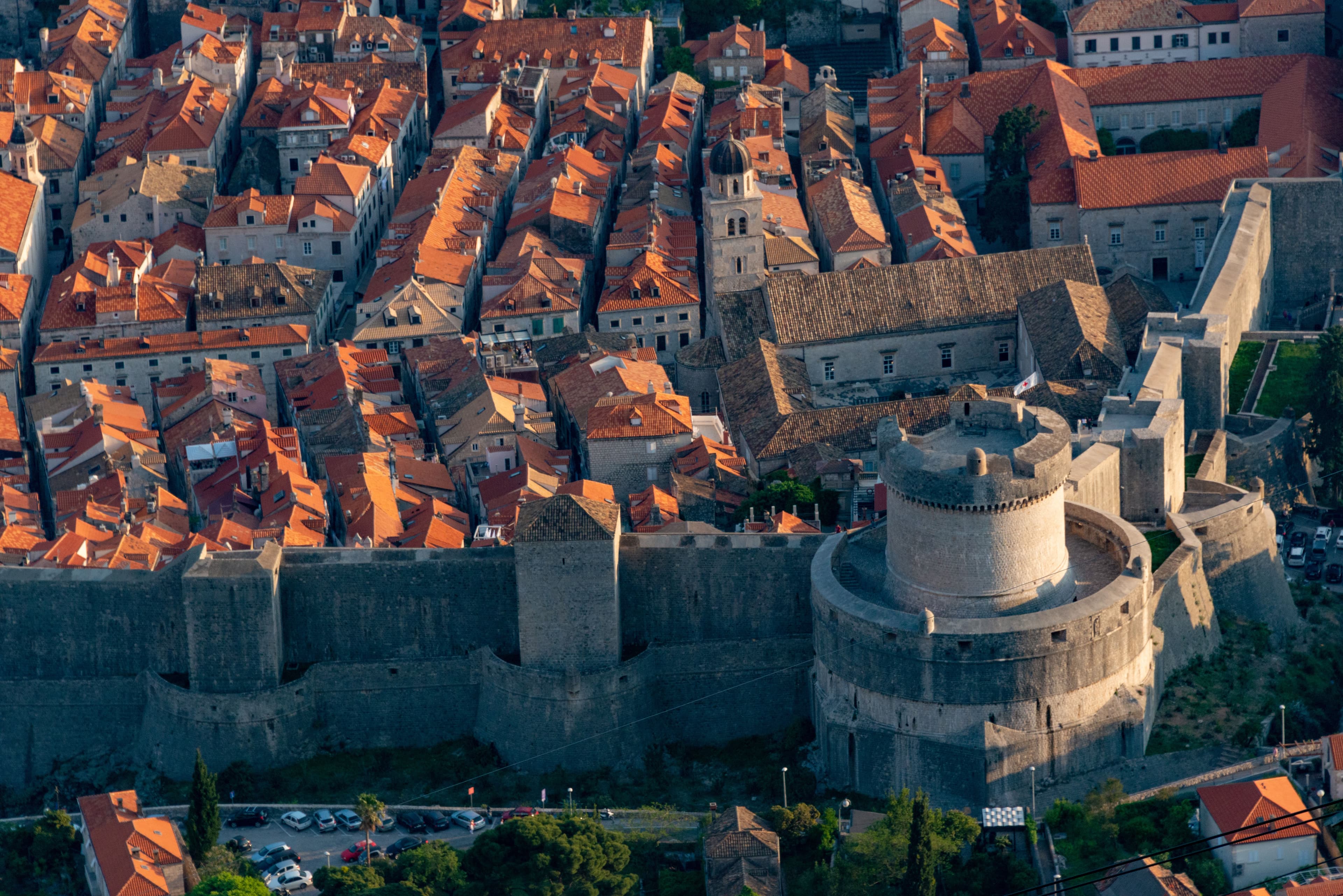 Aerial view of Minceta Tower and terracotta roofs in Dubrovnik.