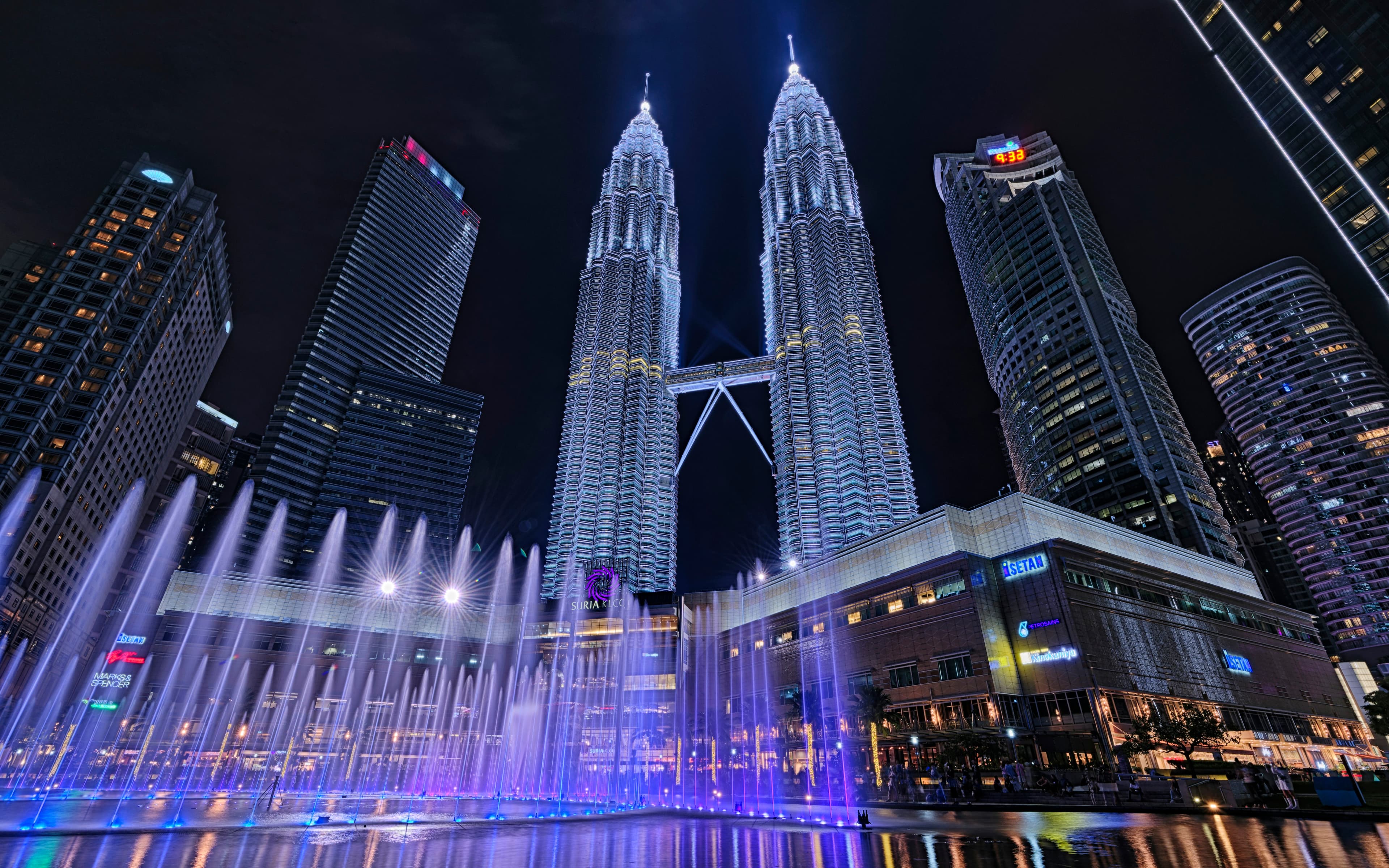 Iconic night view with illuminated fountains.