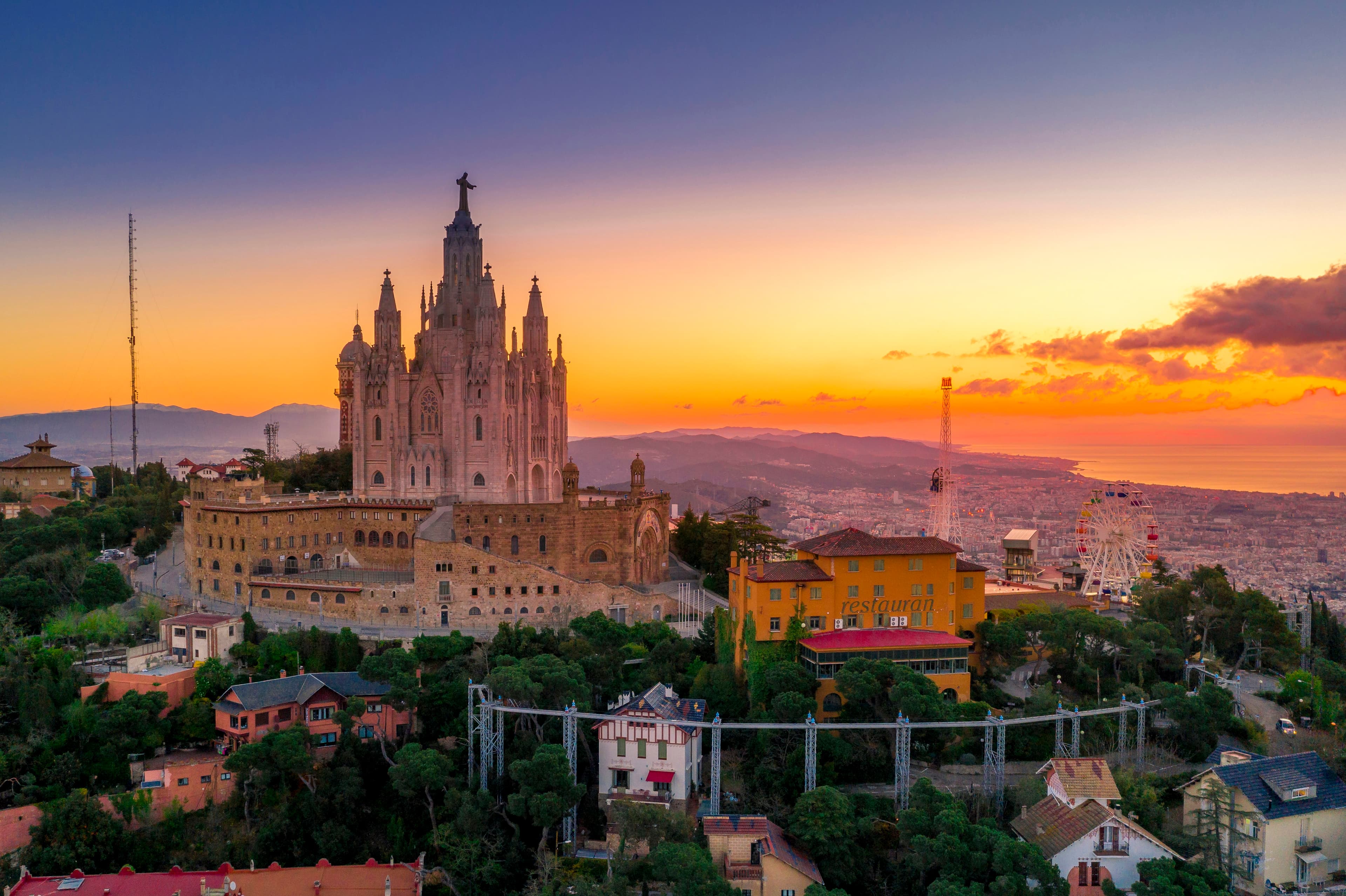 Tibidabo's Sacred Heart Church at a stunning golden sunset